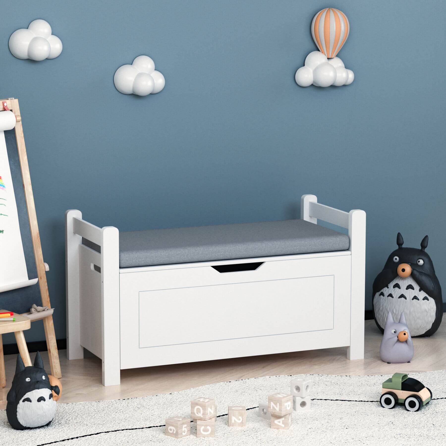MOONRIVER Kids Toy Box Chest with gray cushion in a child's room with toys and decor.