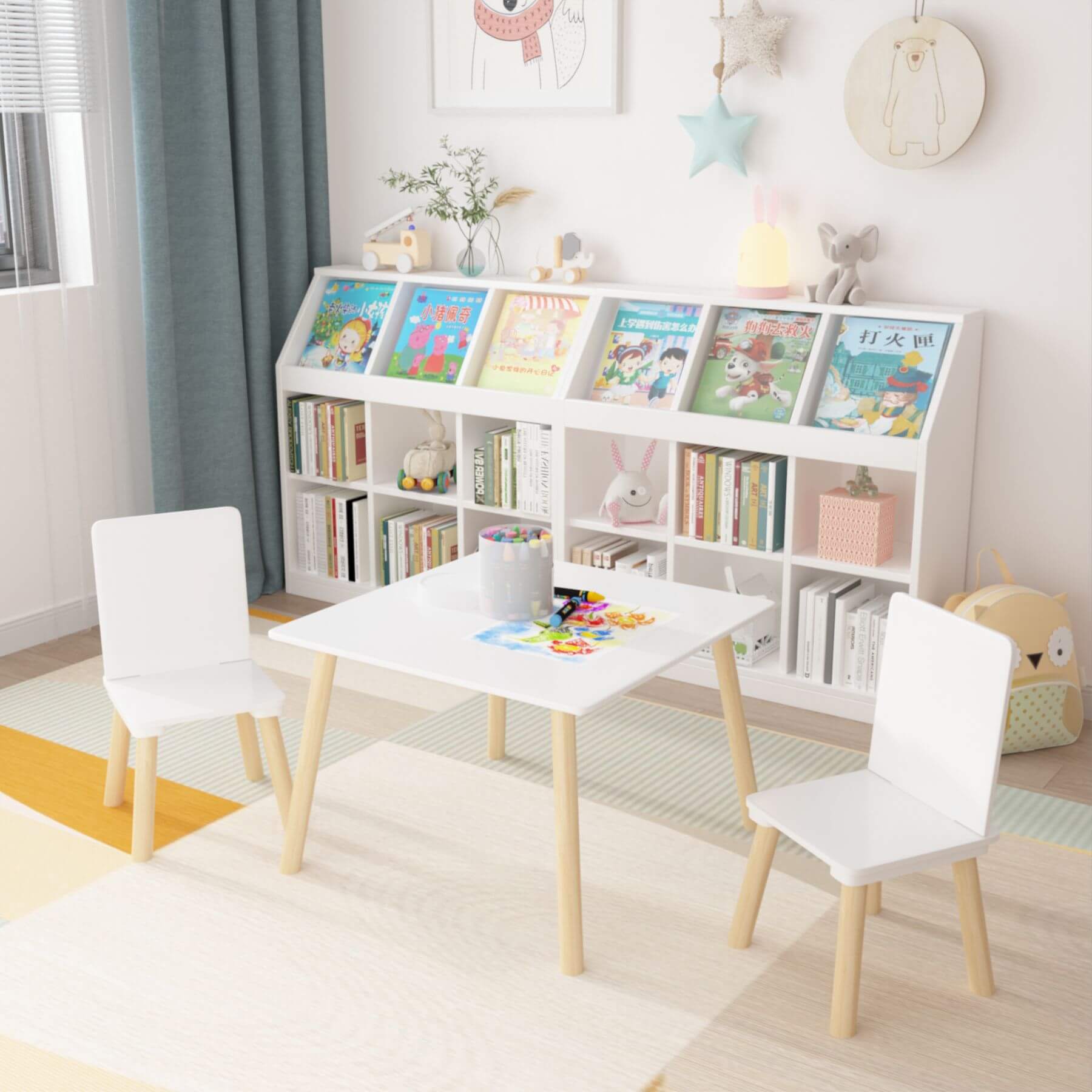 Children's playroom with MOONRIVER Wooden Kids Table and 2 Chairs Set - White, bookshelf, and toys.