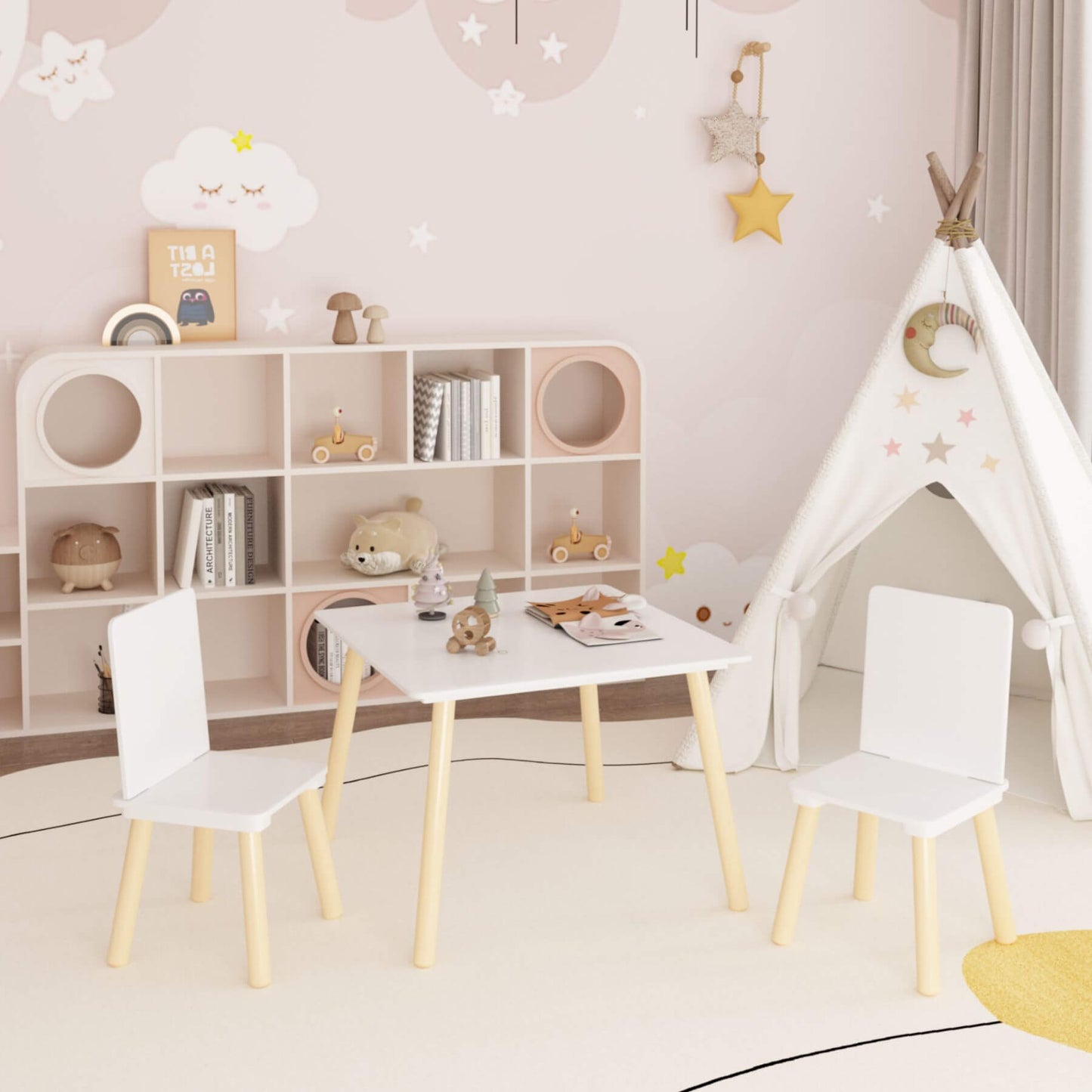 Children's playroom with a white teepee, MOONRIVER Wooden Kids Table and 2 Chairs Set - White against a pink wall.