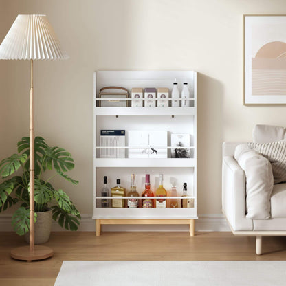 White bookshelf with decorative items in a living room setting