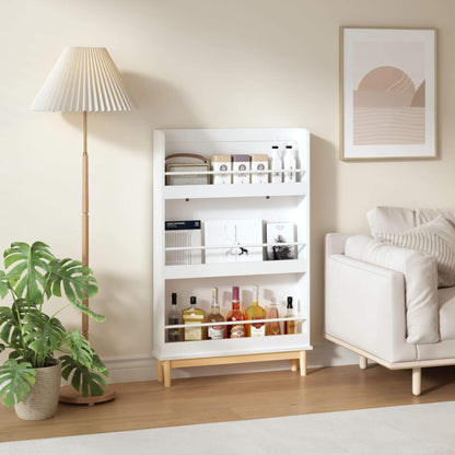 White bookshelf with various items in a living room setting