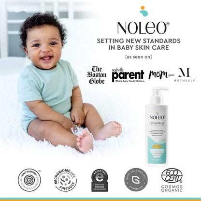 Baby sitting on a white surface with Noleo baby skin care product and brand logos displayed.