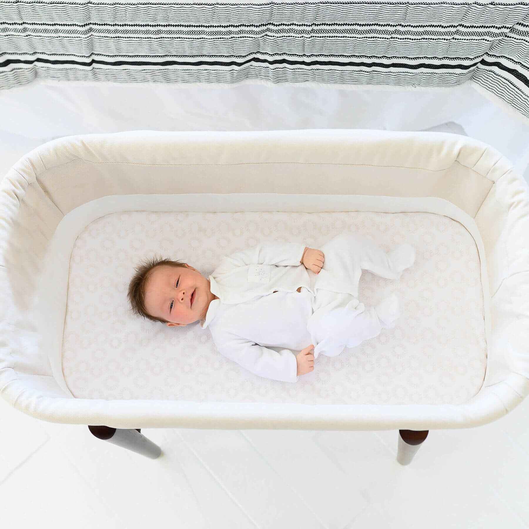 Baby Sleeping in TruBliss SOVA Bassinet Irish Cream