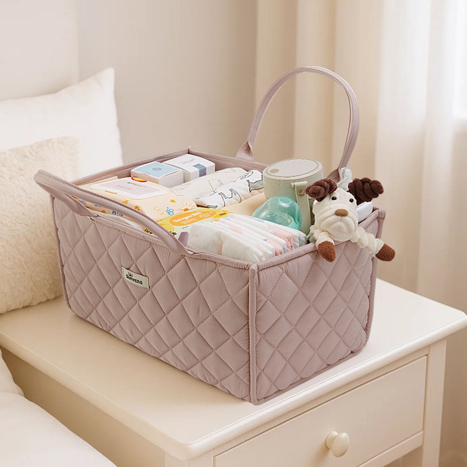 Sunveno Quilted Diaper Caddy Organizer - Brown with diapers, toys, and bottles on a white surface.