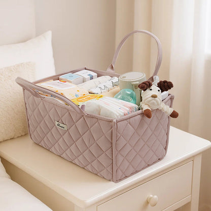 Sunveno Quilted Diaper Caddy Organizer - Brown with diapers, toys, and bottles on a white surface.