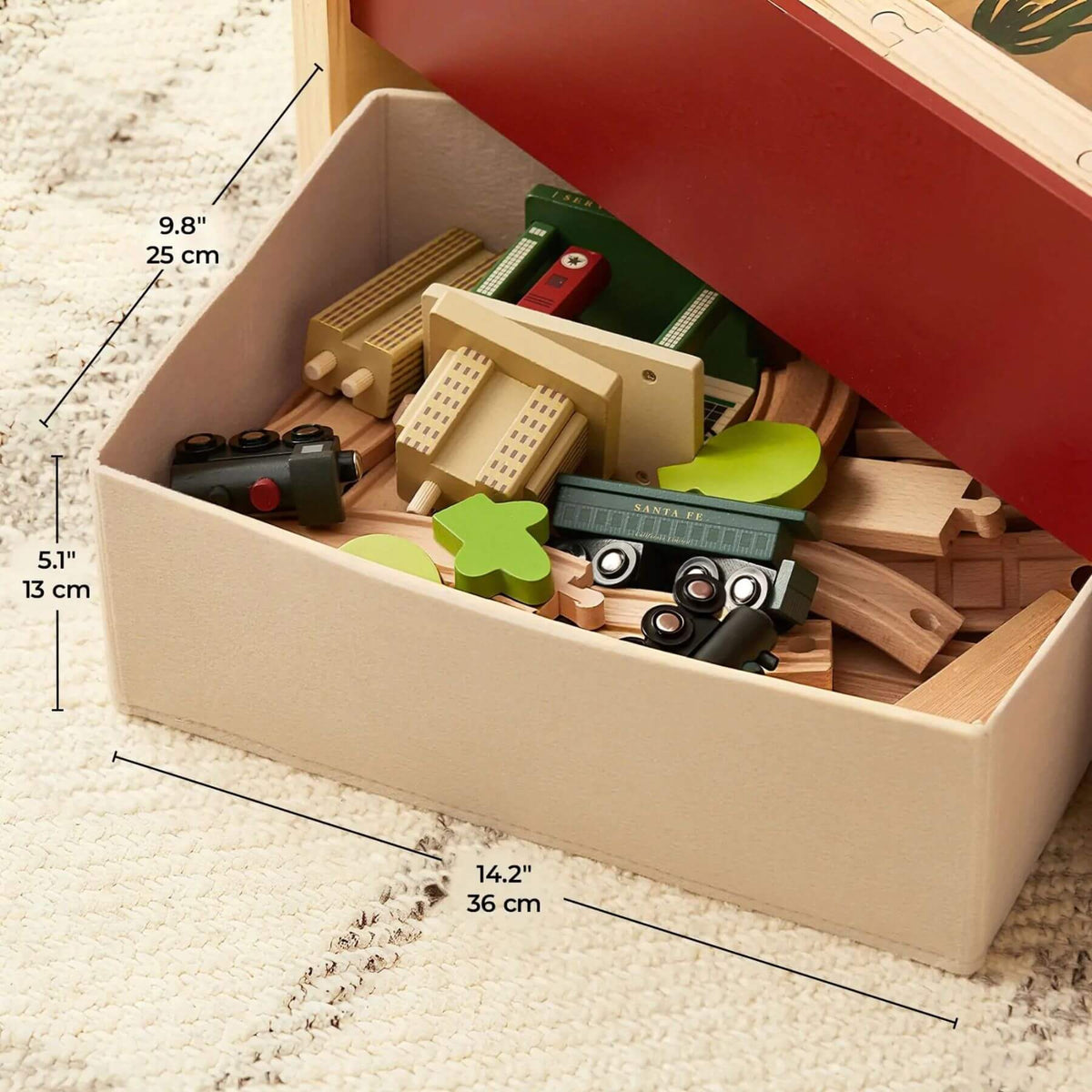 Toy train set in a storage box with dimensions indicated