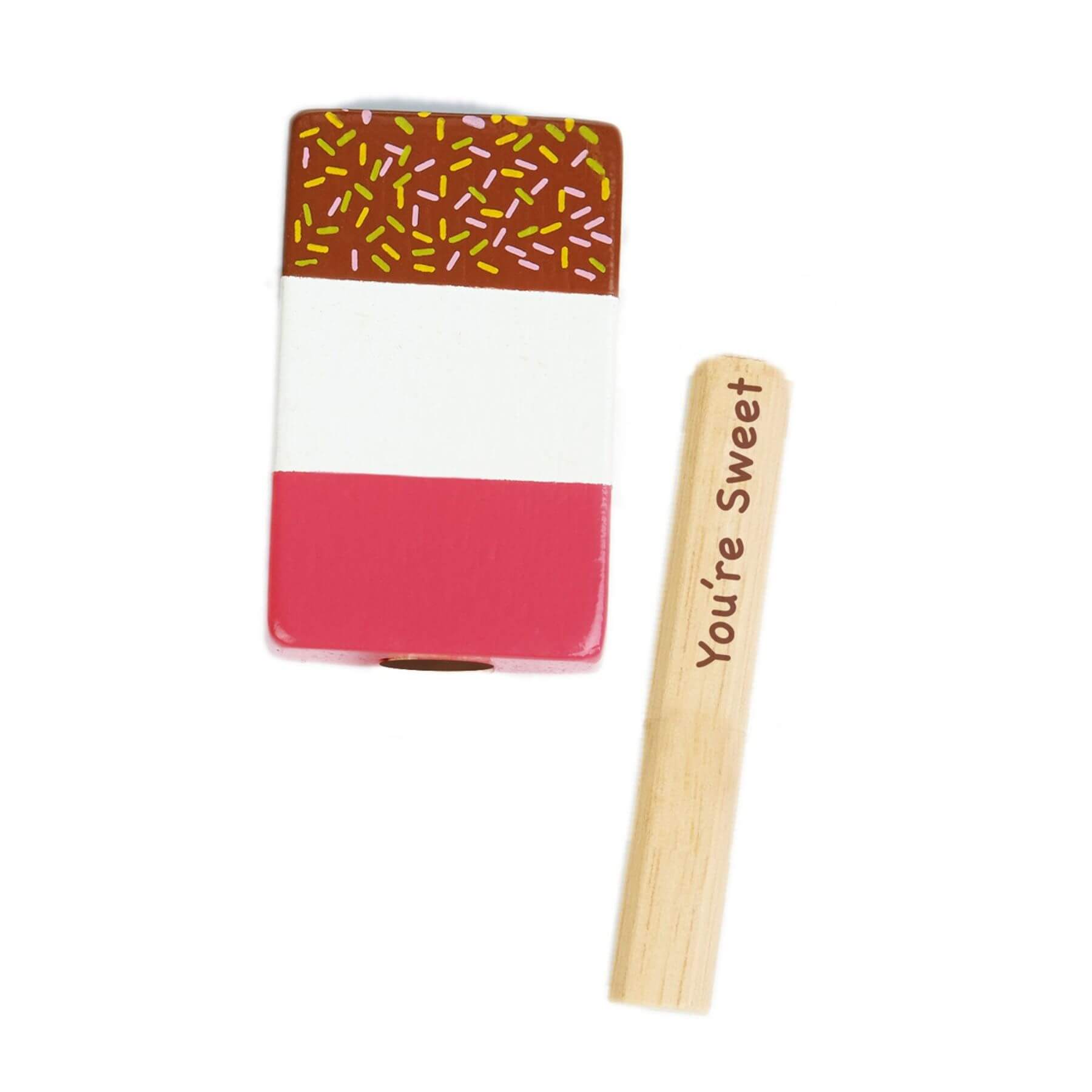 Wooden ice cream toy with a pink base, brown top with sprinkles, and a wooden stick with 'You're Sweet' text on a white background.