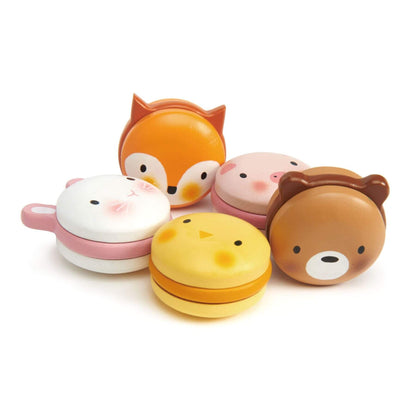 Set of five animal-themed cookie toys on a white background