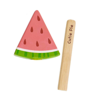 Wooden toy watermelon slice with a wooden stick on a white background