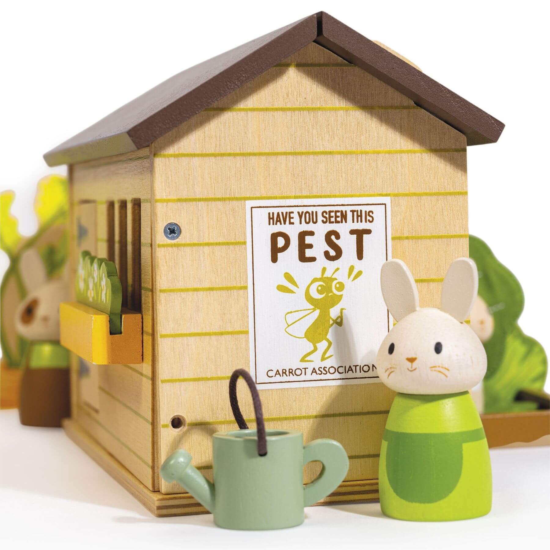 Wooden house with a sign and rabbit figurine on a white background