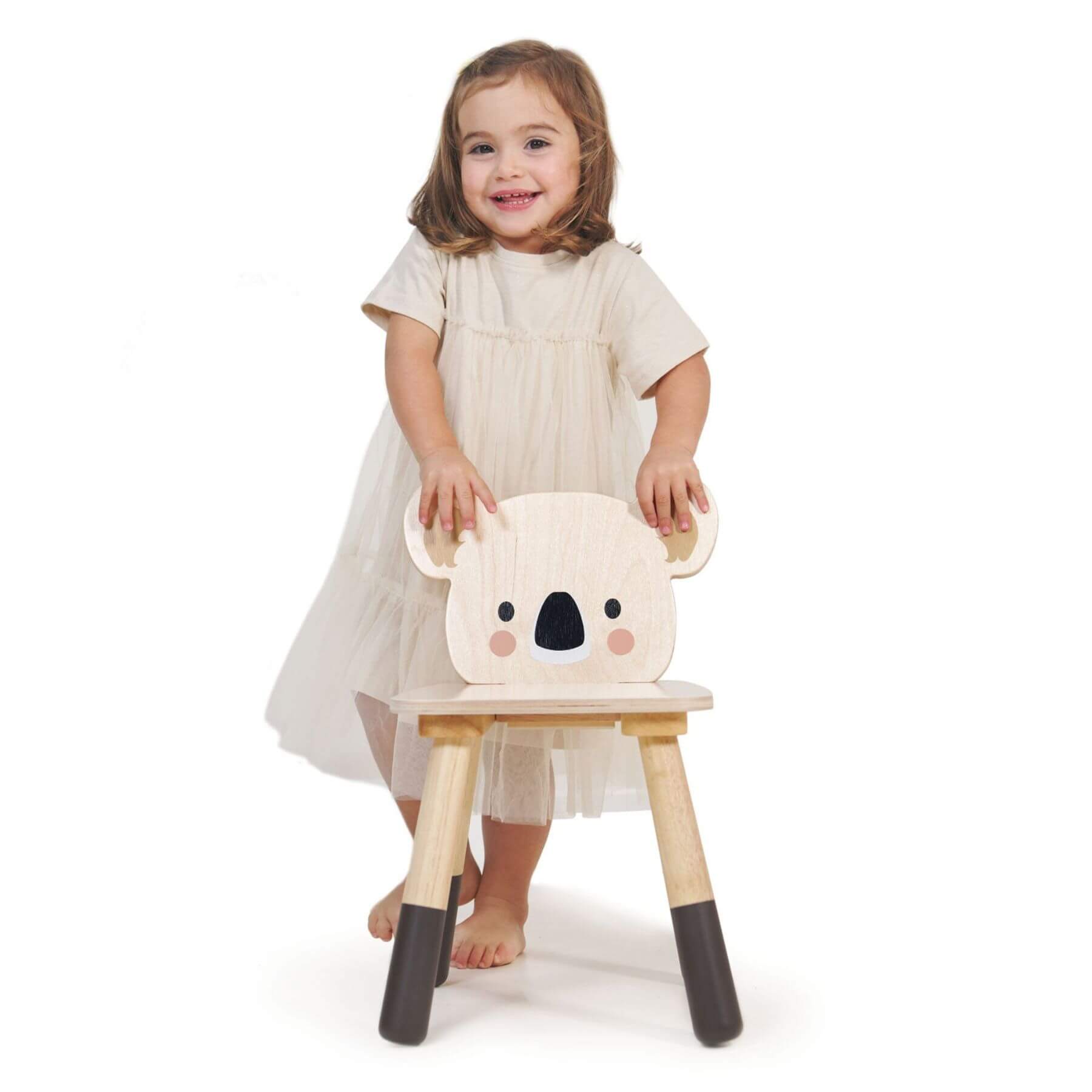 Child standing behind Tender Leaf Forest Koala Chair