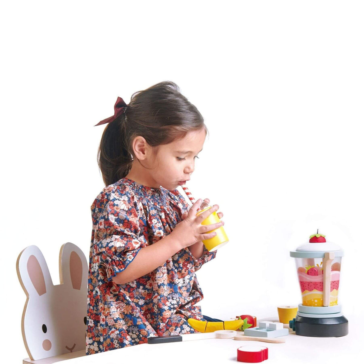 Child playing with Tender Leaf Fruity Blender