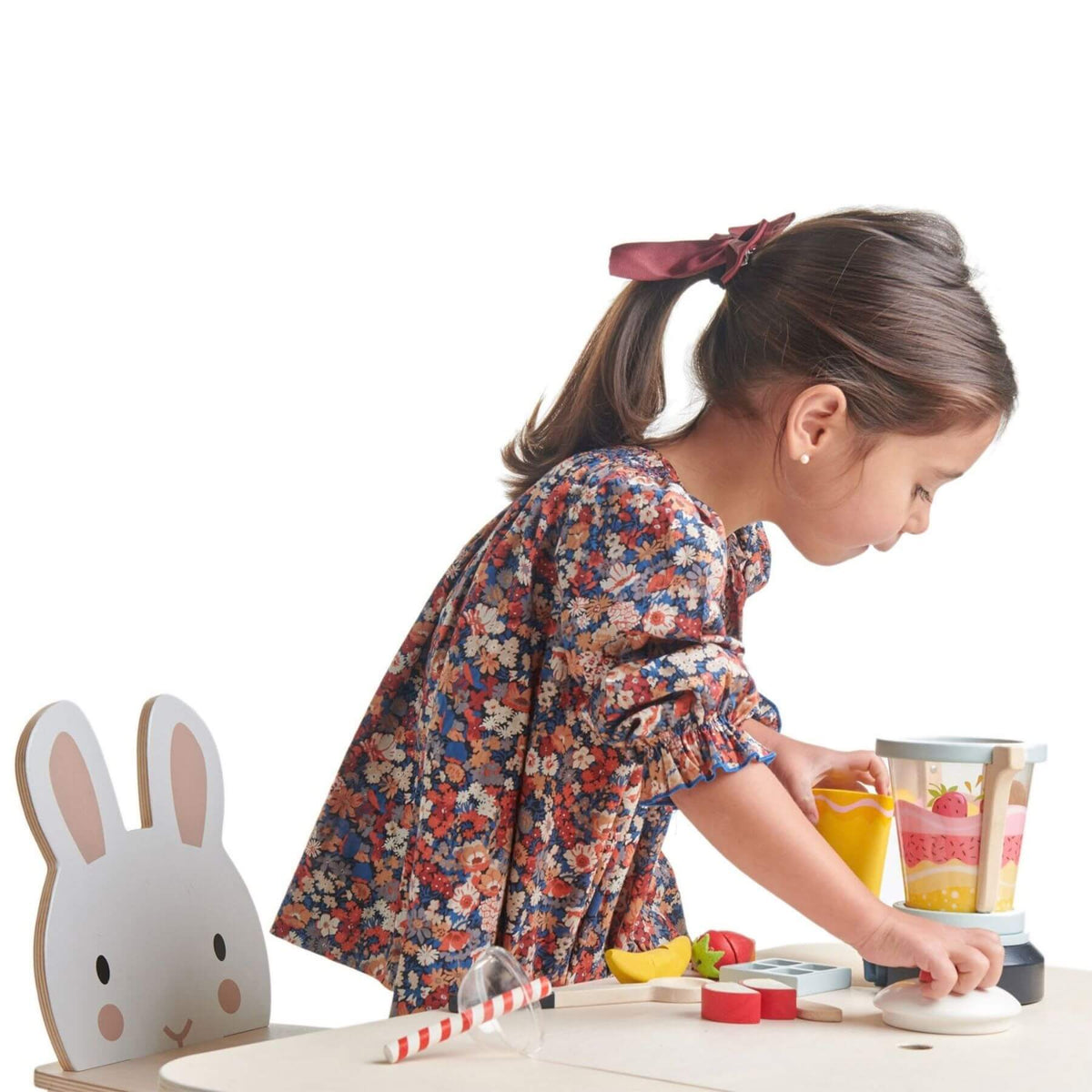 Child playing with Tender Leaf Fruity Blender