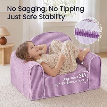 A child wearing floral pajamas lies on Tiny Land® GentleSnug Corduroy Kid Chair - Purple in a bright room.