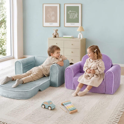 Two children playing in a bright nursery with two small upholstered armchairs. A boy lies on a light blue striped chair while a girl sits in a purple striped chair, both holding plush toys.