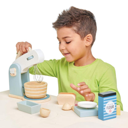 Boy playing with Tender Leaf Home Baking Set