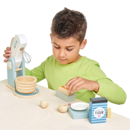 Boy playing with Tender Leaf Home Baking Set