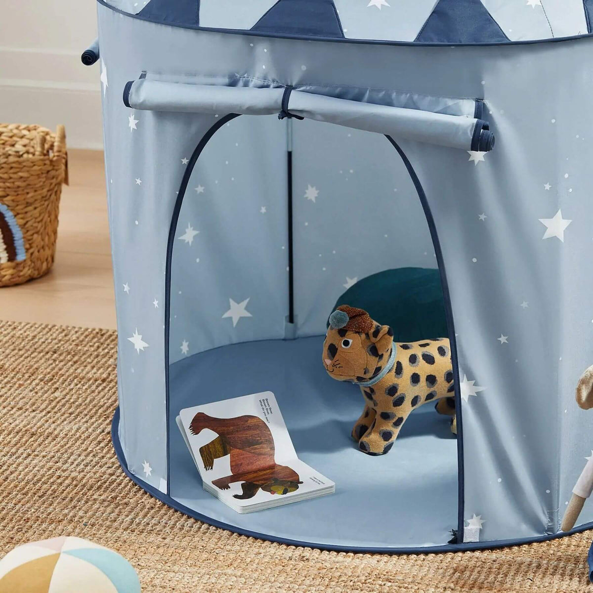 Tiny Land® Kids Tent - Blue, shown on a woven rug with a plush toy and a small book inside.