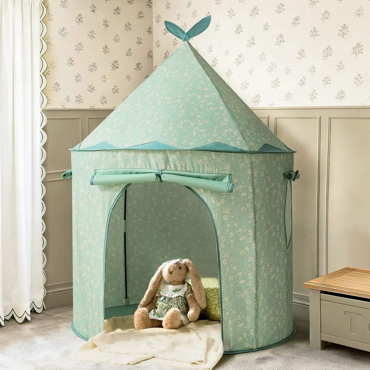 Tiny Land® Kids Tent - Green with a teddy bear inside, set against a floral wallpapered wall.