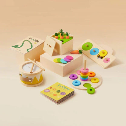 Set of colorful wooden educational toys on a beige background