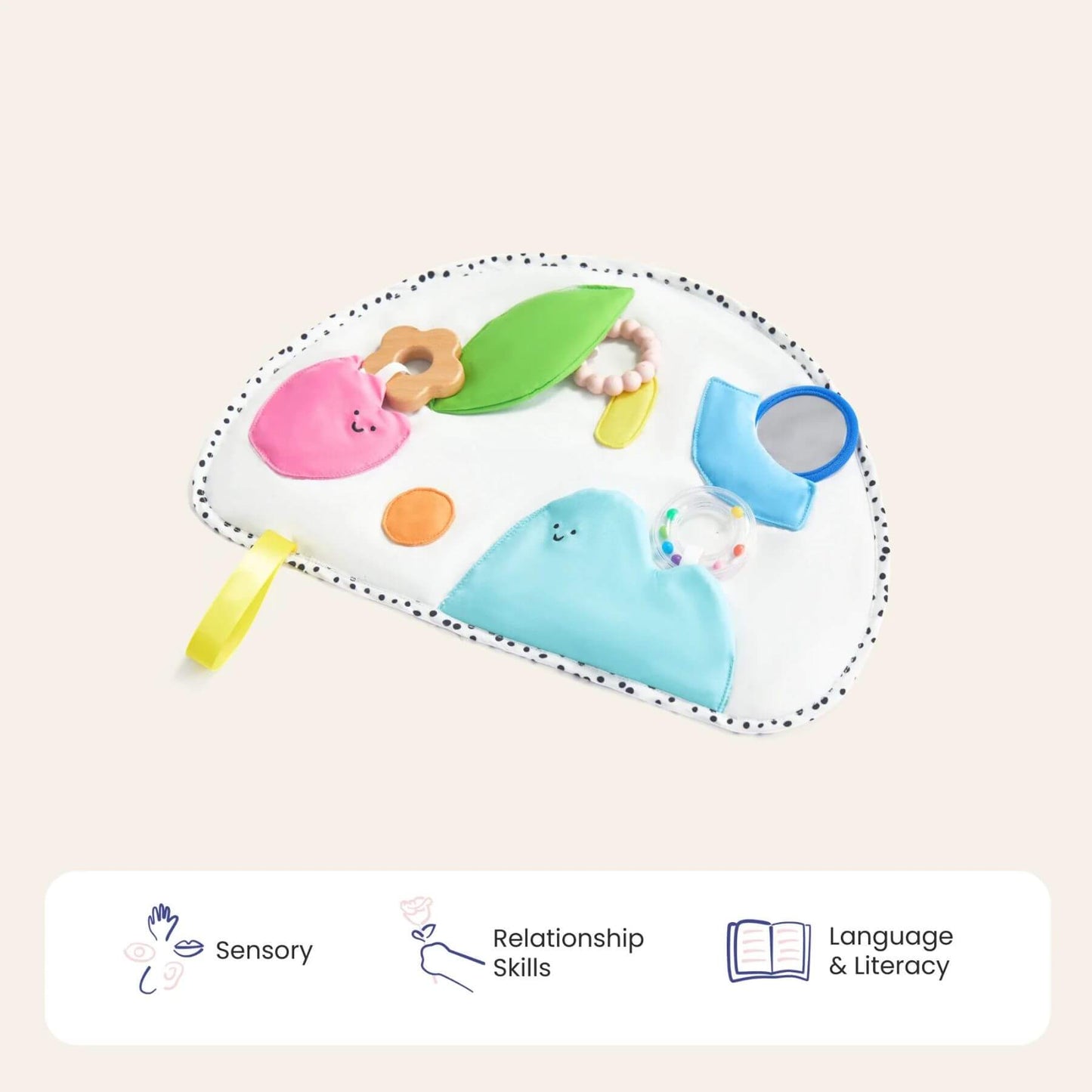 Baby toy with colorful elements on a beige background