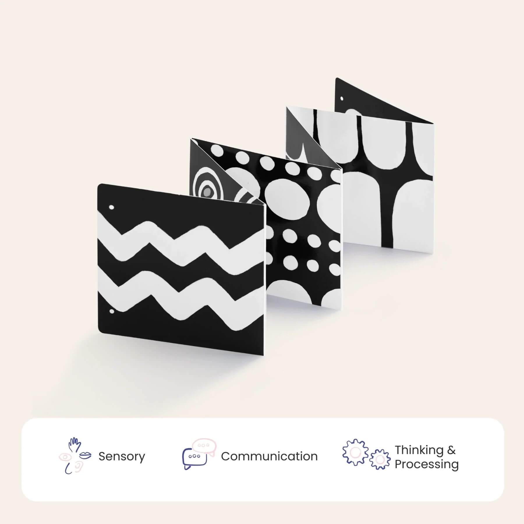 Black and white patterned folders on a light beige background