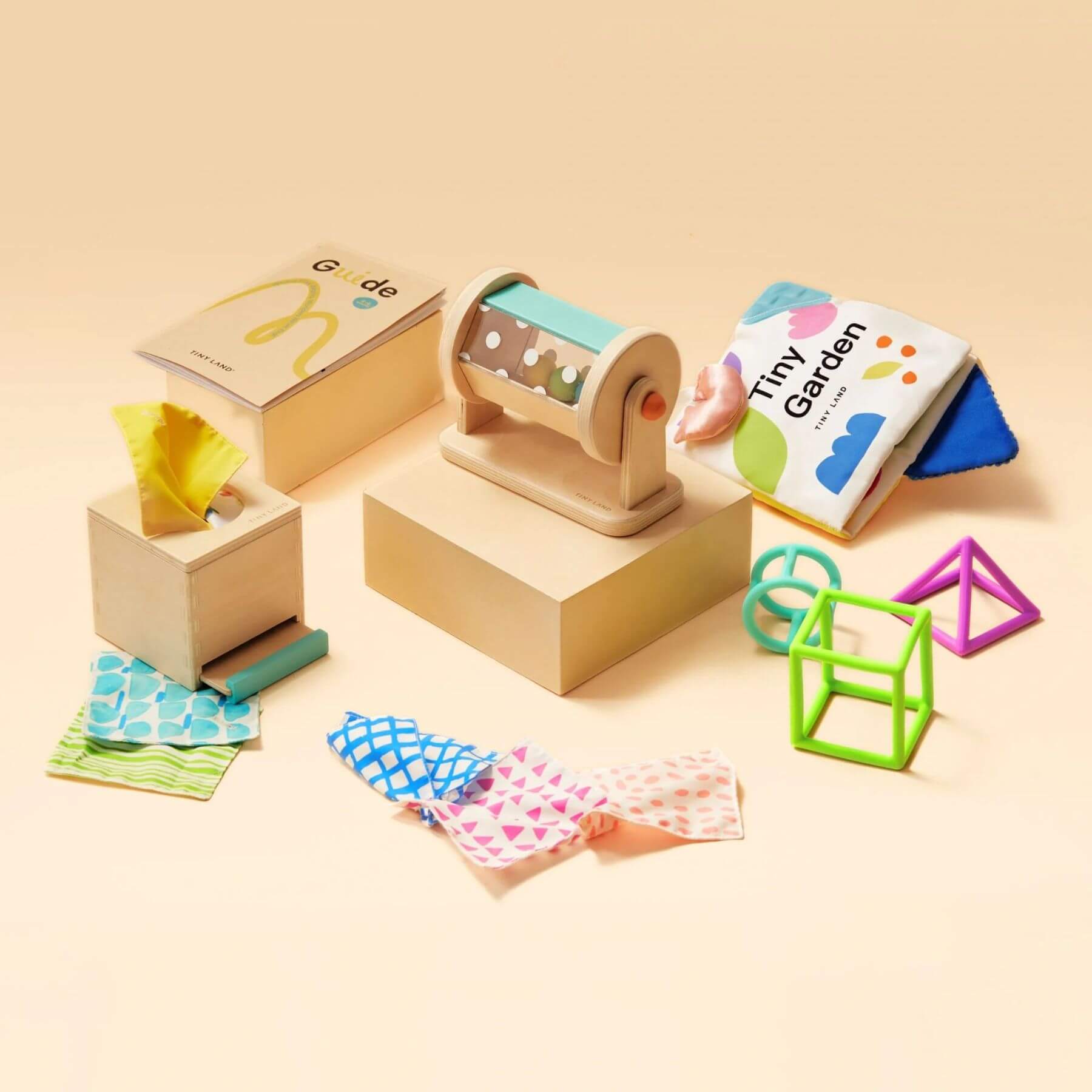 Children's educational toys and books on a beige background