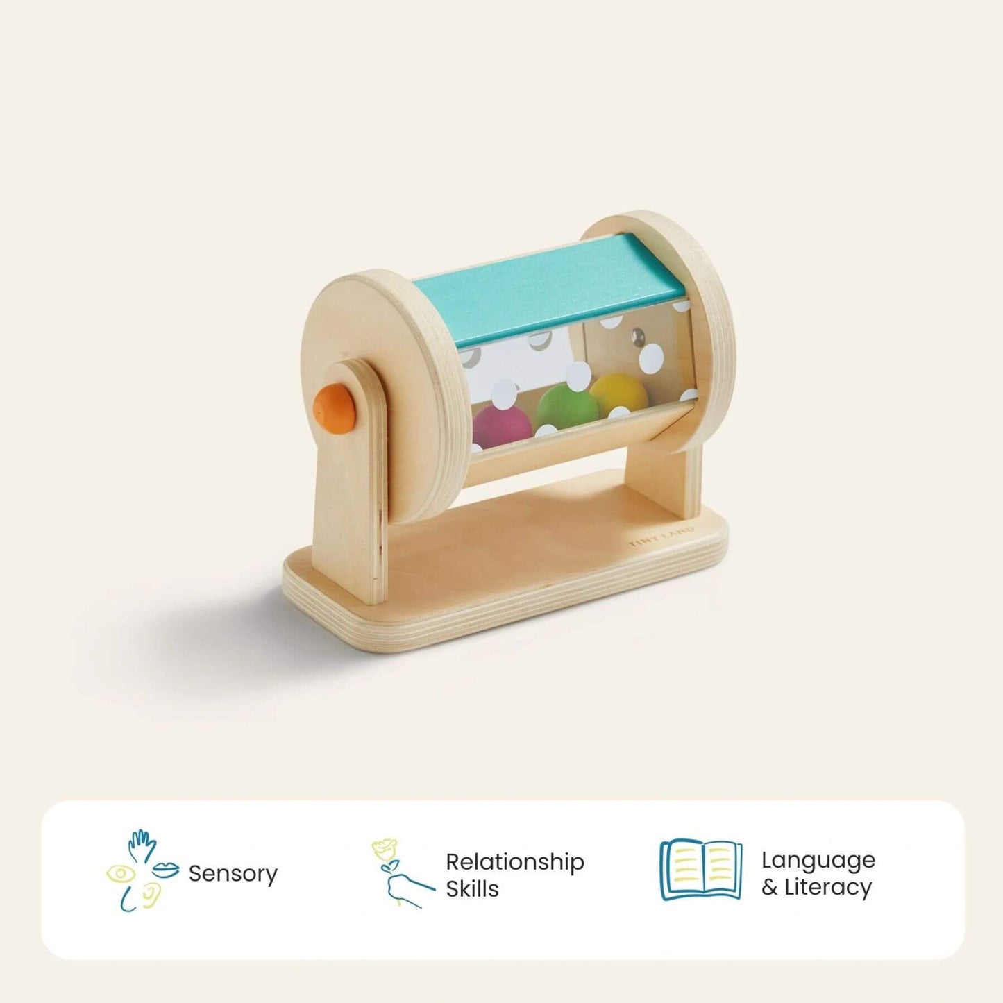 Wooden toy with colorful balls inside, labeled for sensory, relationship, and language skills on a light background.