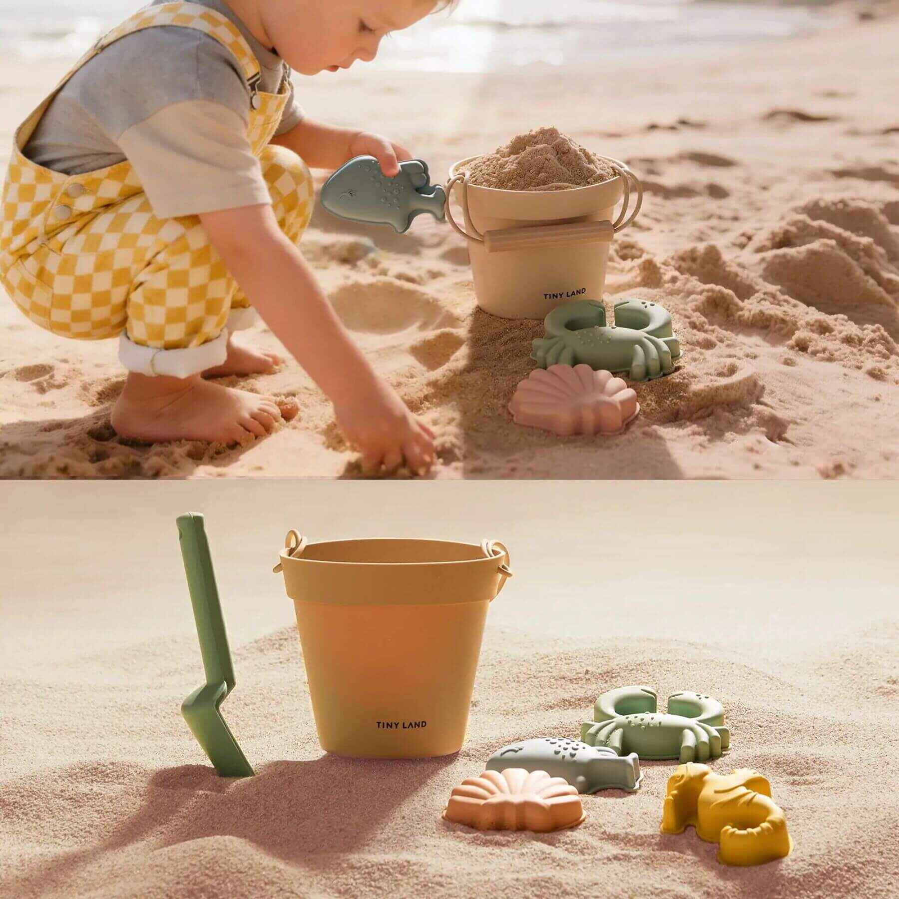 Child playing with sand toys on a sandy beach