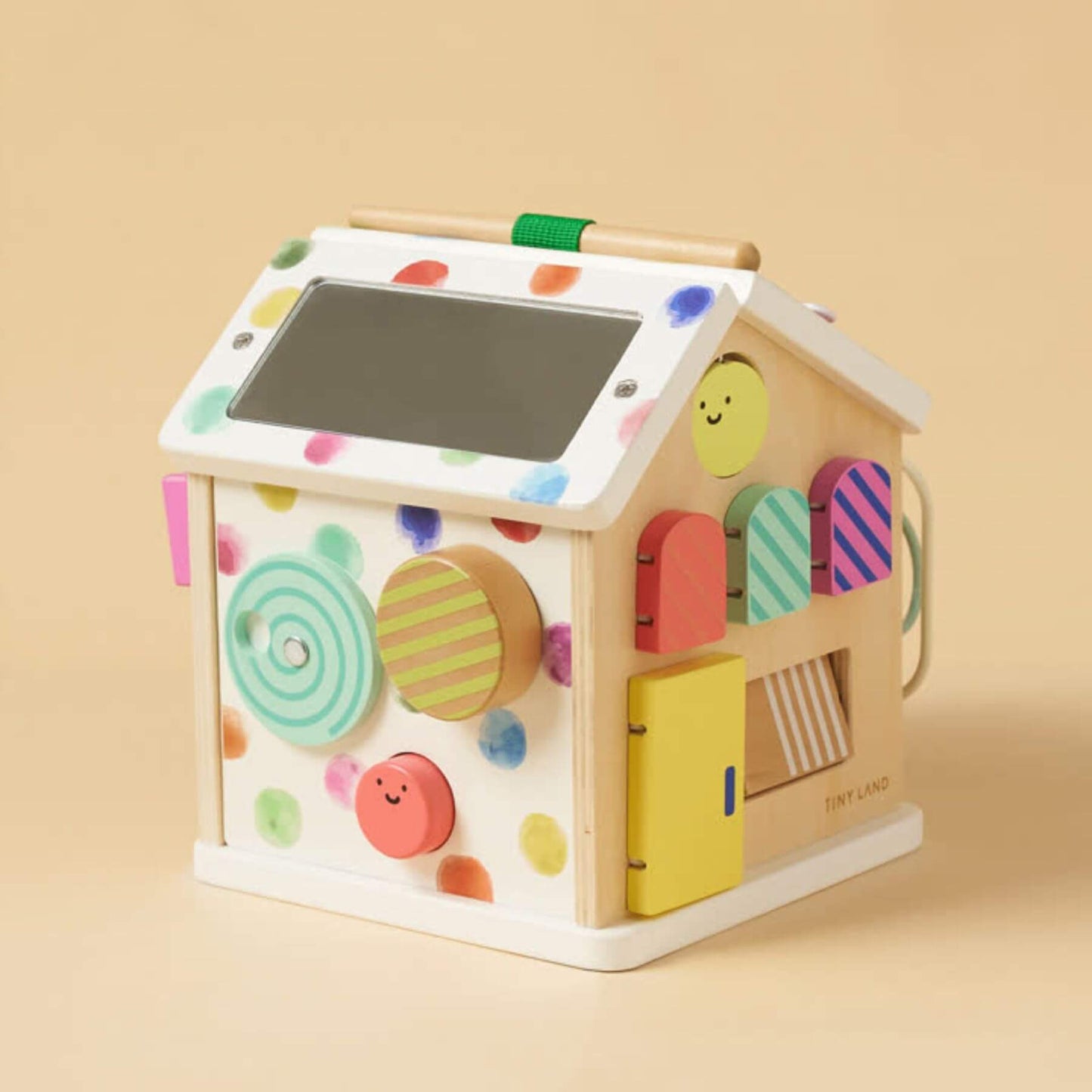 Tiny Land® Cottage Activity Cube - Rainbow on a beige background