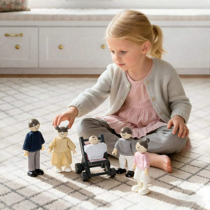 Young girl playing with toy figures on a checkered floor.