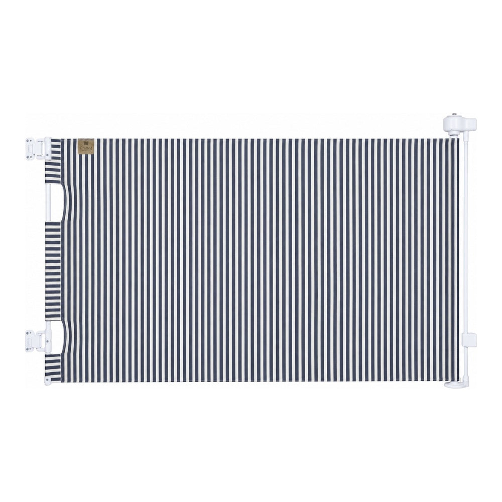 A horizontal baby safety guard with navy blue and white vertical stripes, mounted on a white frame with white plastic hardware.