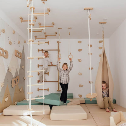 Wood and Hearts Climbing Wall Playground where children are playing.