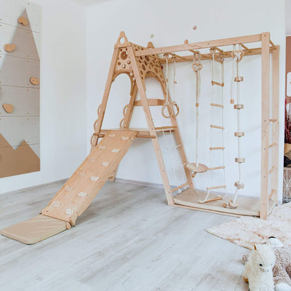 Wood and Hearts Kid Climbing Structure in a room.
