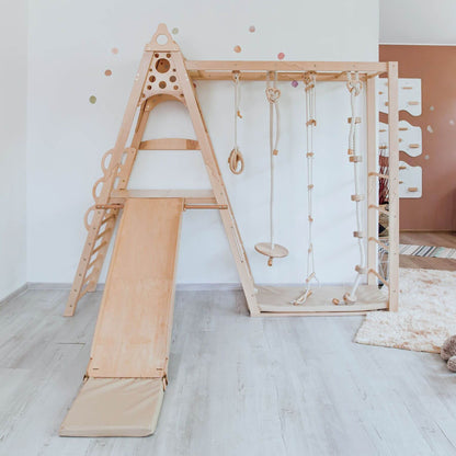 Wood and Hearts Kid Climbing Structure in a room.