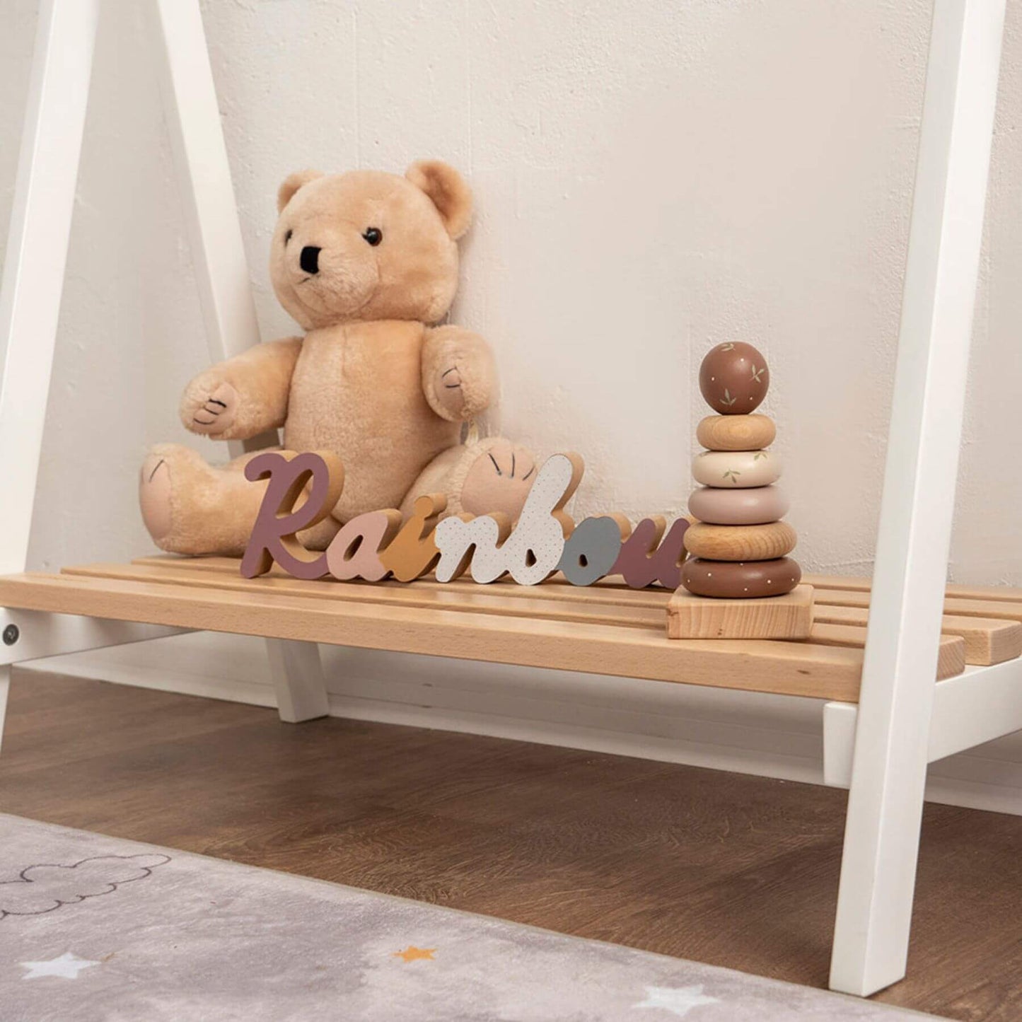 Teddy bear and wooden toys on Wood and Hearts Toddler's Clothes Rack