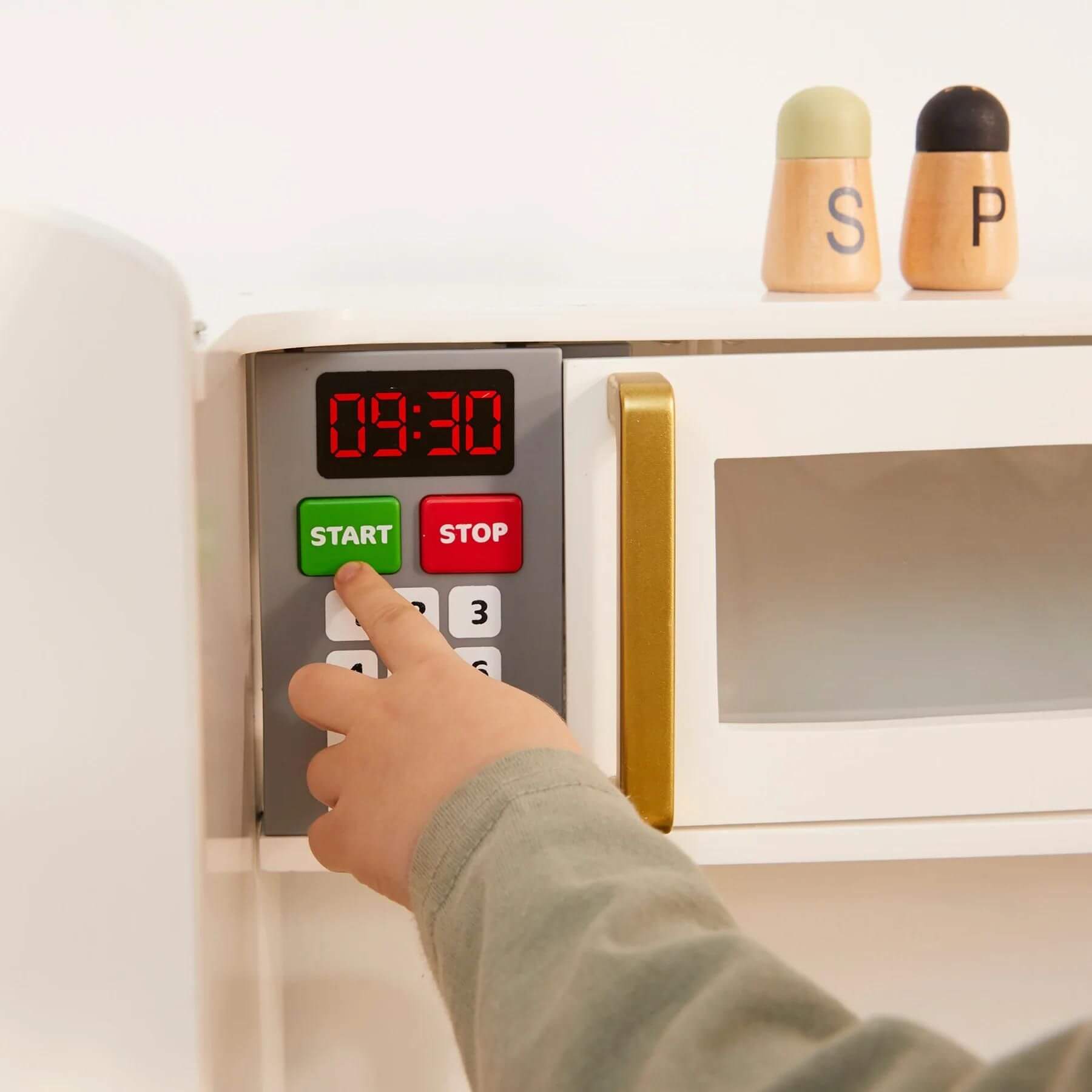 Finger Pressing Start Button of Microwave