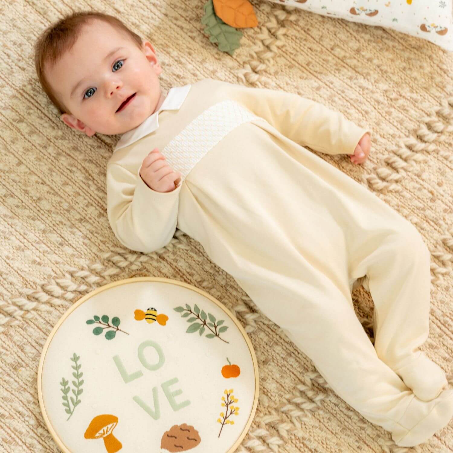 Baby Boy Wearing ANDY Boys Beige Organic Cotton Babygrow