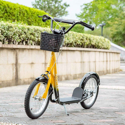 Aosom Youth Scooter - Yellow on a paved path with greenery in the background