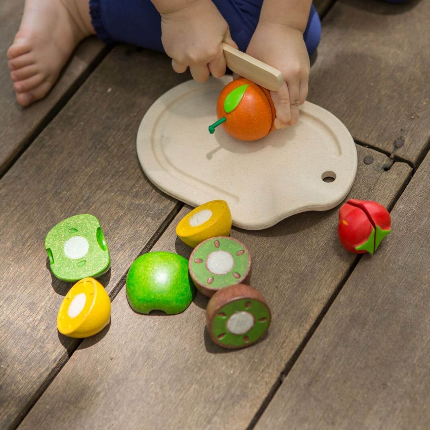 Kid Playing PlanToys Assorted Fruit Set