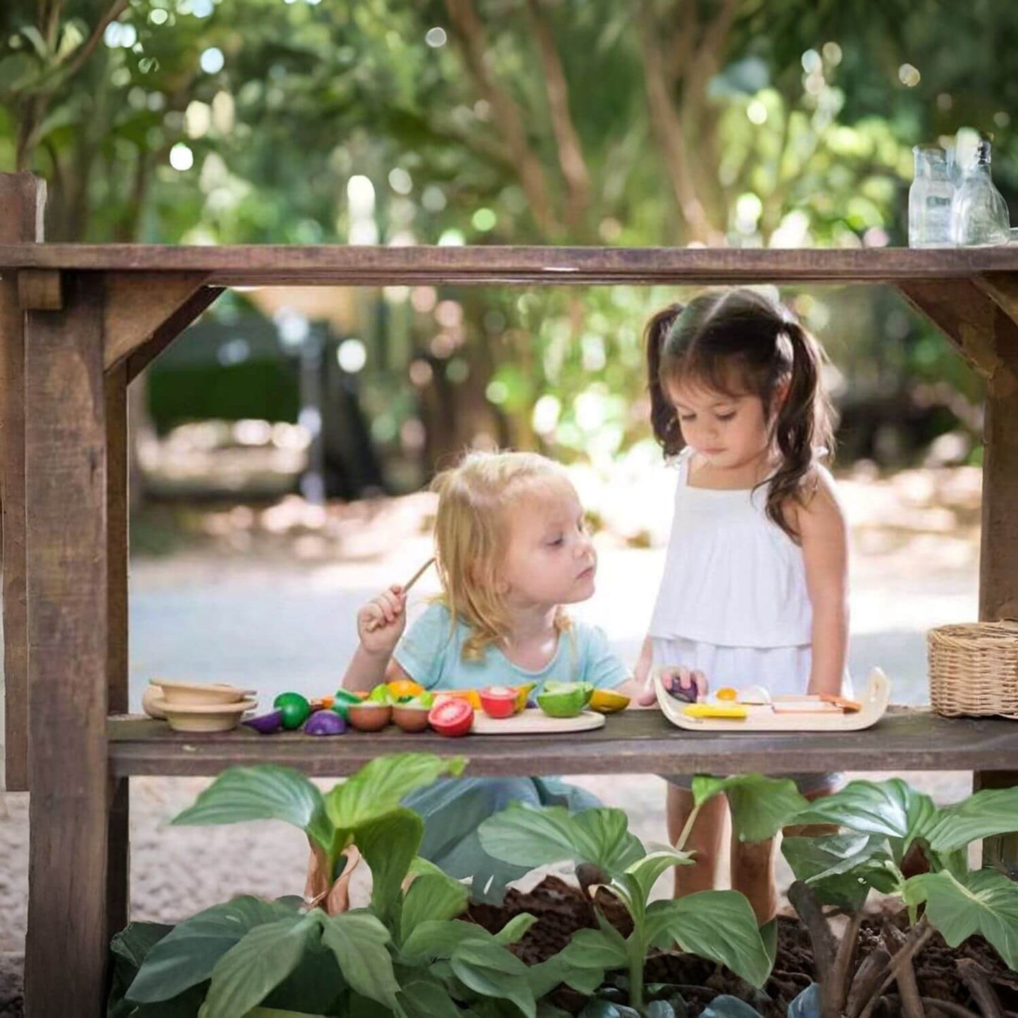 Girls Playing PlanToys Assorted Fruit & Vegetable