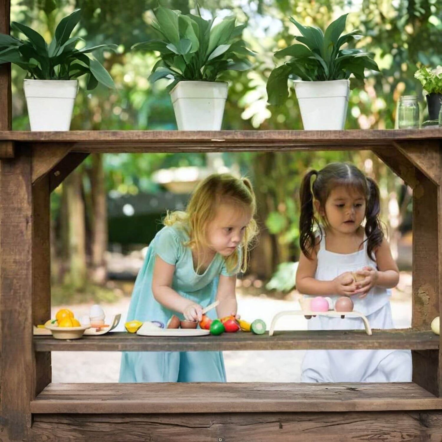 Girls Playing PlanToys Assorted Fruit & Vegetable