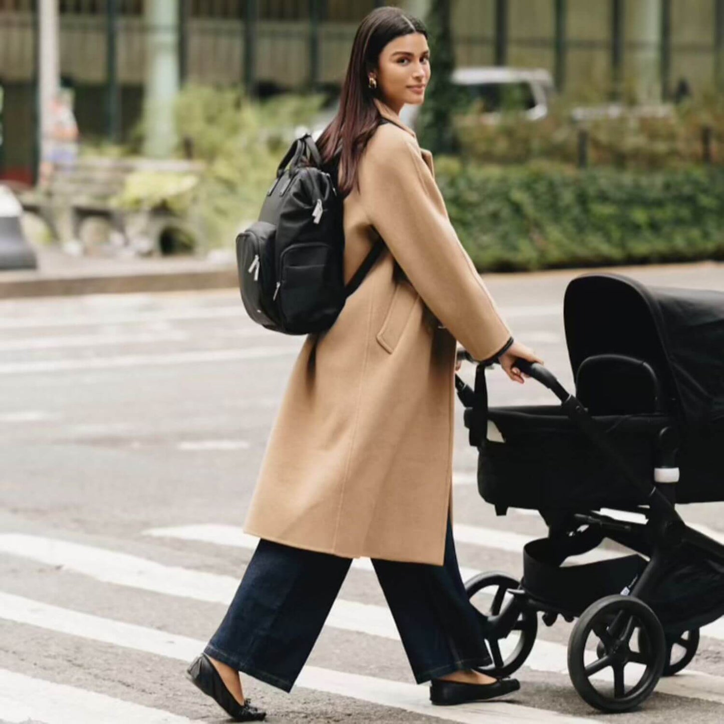 Woman Carrying augustnoa Diaper Bag Black