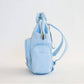 Side of augustnoa Diaper Bag Blue