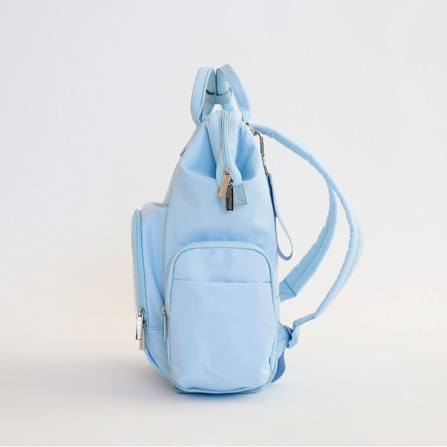 Side of augustnoa Diaper Bag Blue