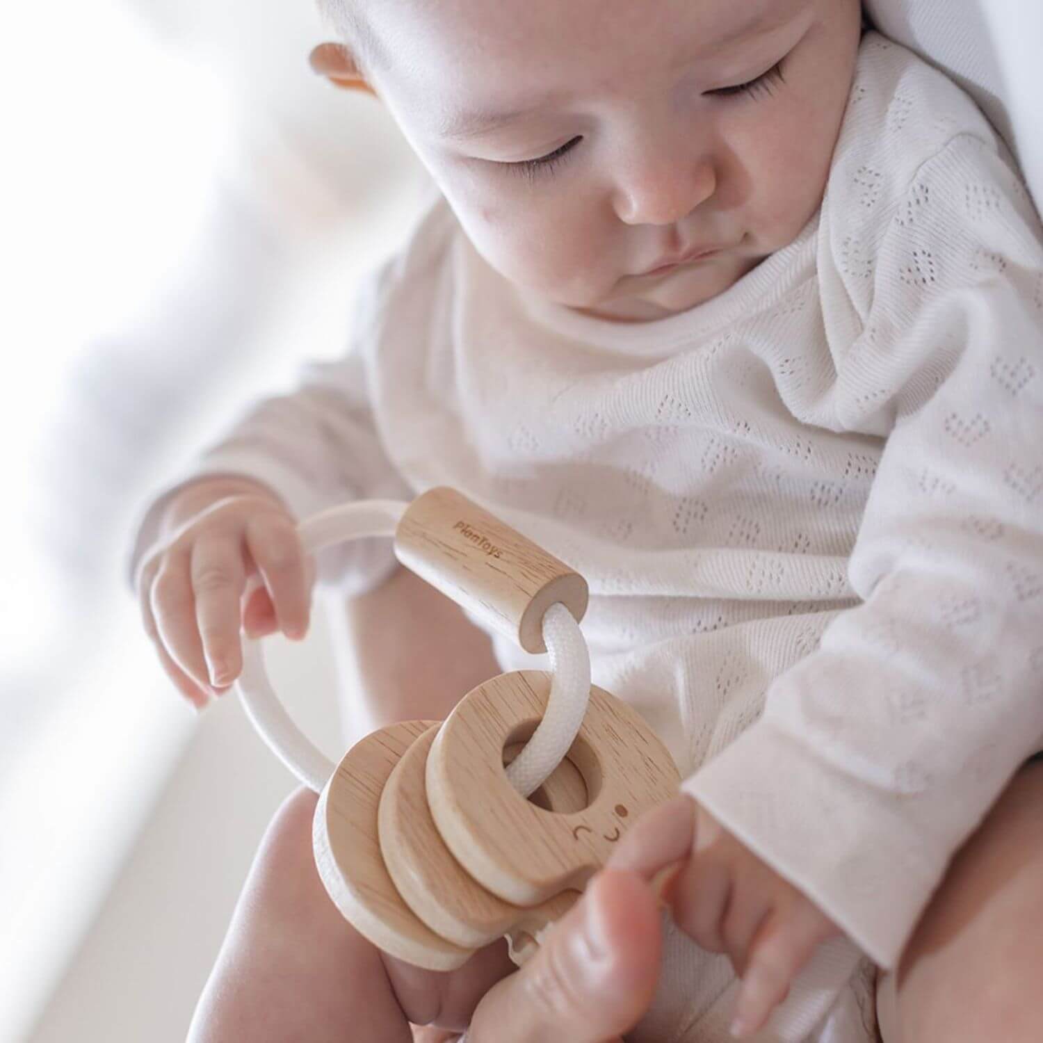 Baby Holding PlanToys Baby Key Rattle - Natural