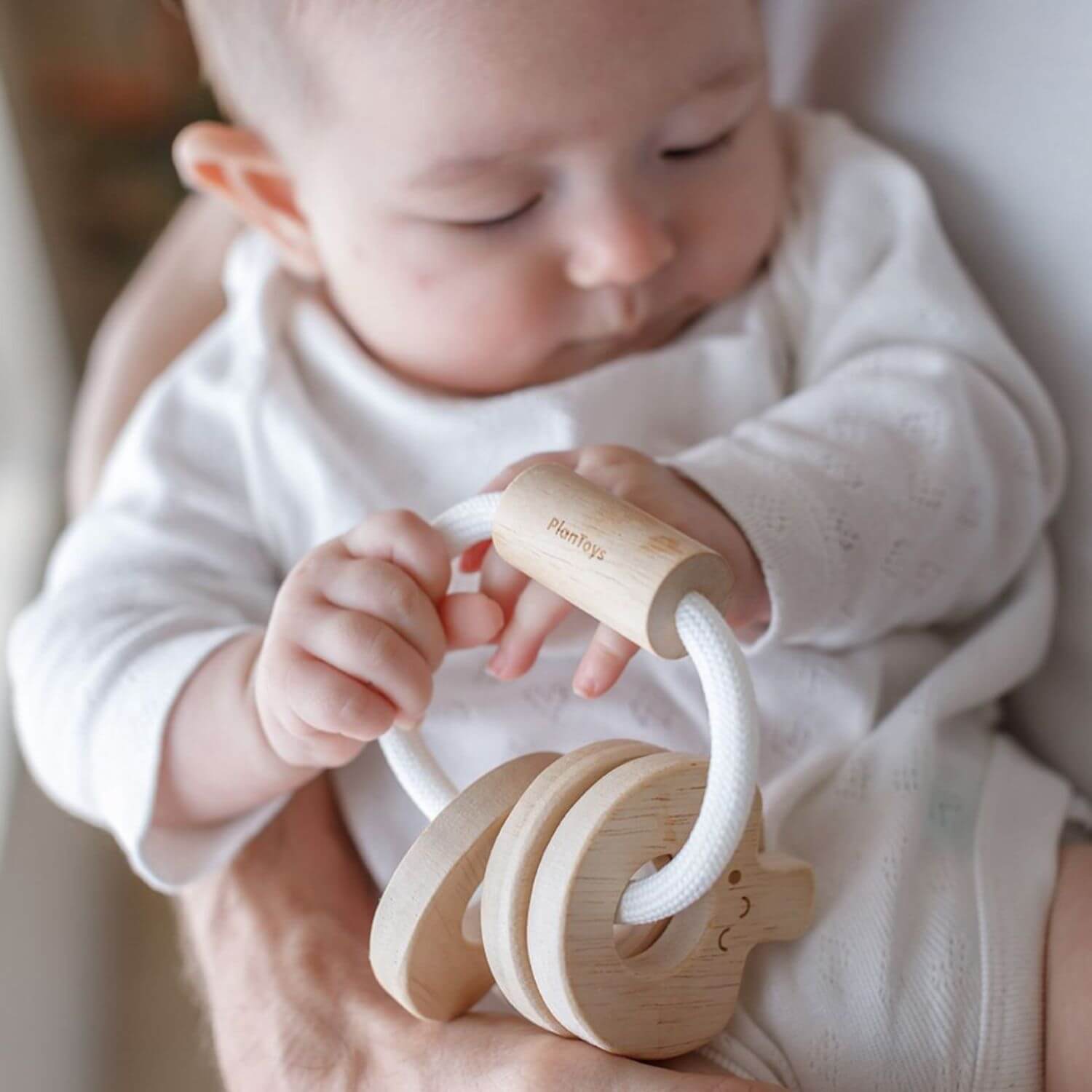 Baby Holding PlanToys Baby Key Rattle - Natural