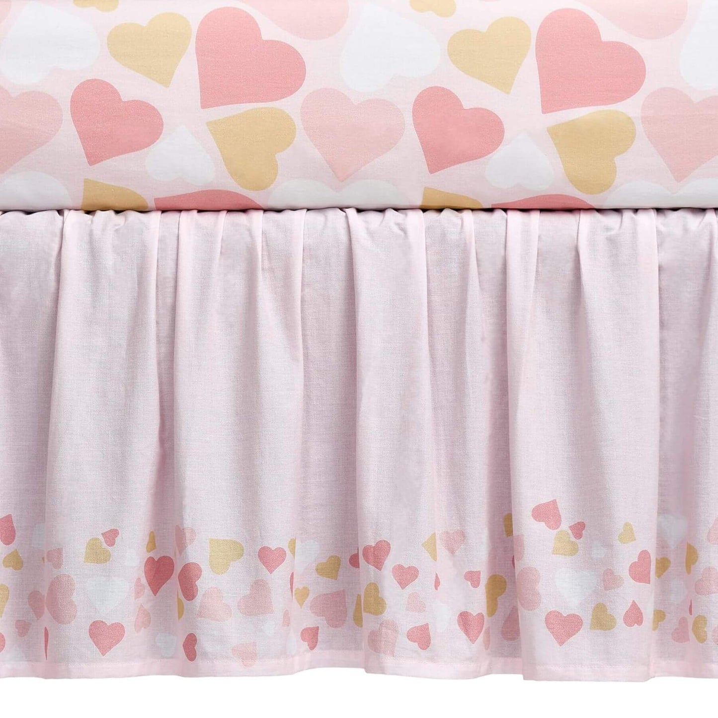 Crib skirt with heart pattern on a white background