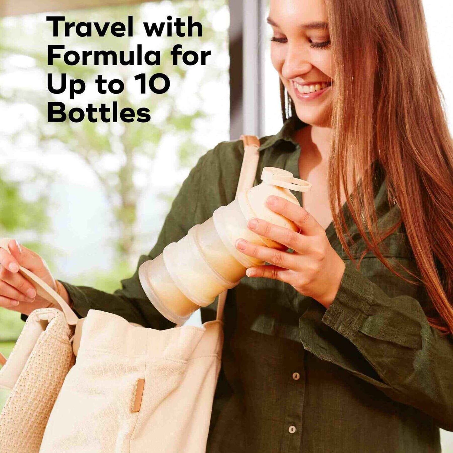 Woman holding Babydose Formula Dispenser