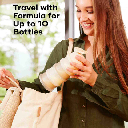 Woman holding Babydose Formula Dispenser